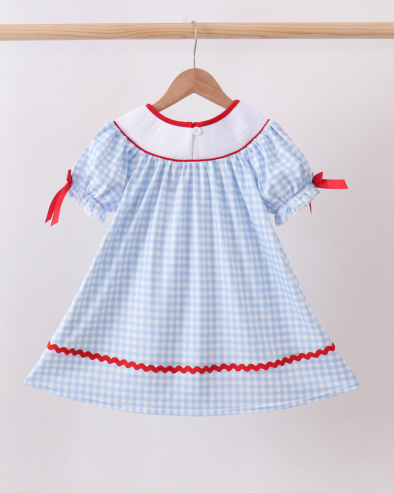 Blue School Bus Smocked Gingham Dress on wooden hanger