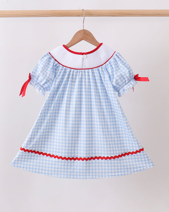 Blue School Bus Smocked Gingham Dress on wooden hanger