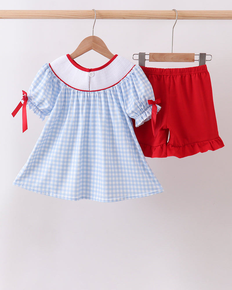 Blue School Bus Smocked Gingham Ruffle Shorts Set on wooden hanger