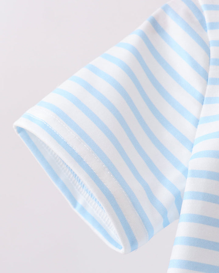 Striped fabric with light blue and white stripes on a light gray background