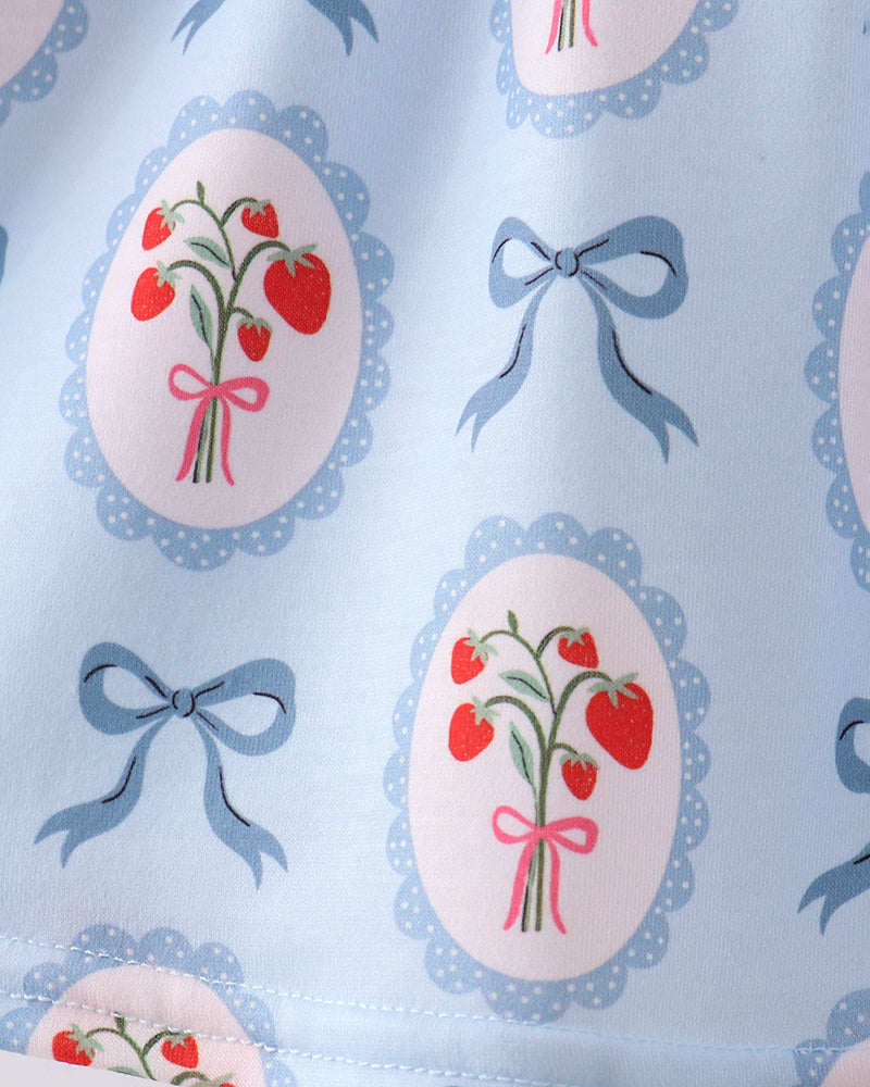 Pattern of red flowers with pink ribbons and blue bows on a light blue background
