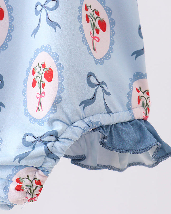Swimsuit with red floral and bow patterns on a white background