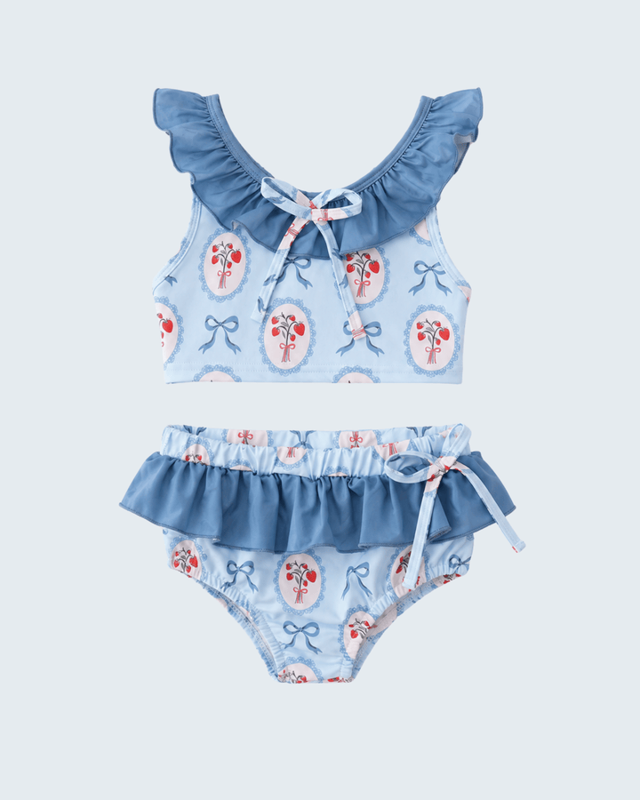 Blue Strawberry Bow Ruffle Two-Piece Swimsuit on light blue background