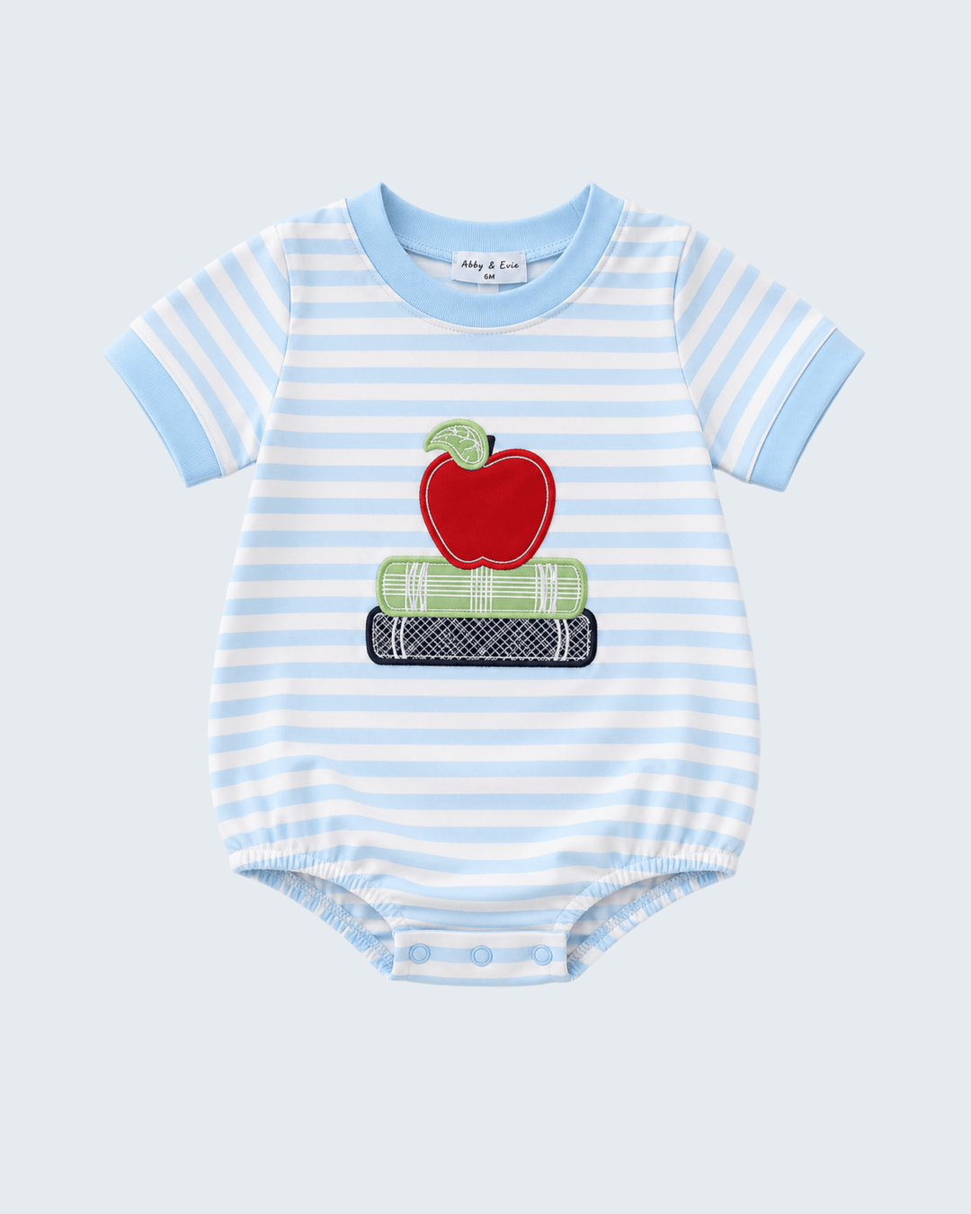 Blue and white striped bubble with apple and books appliqué