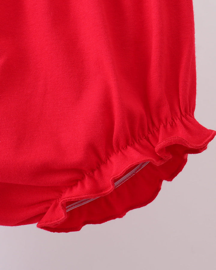 Close-up of a red bloomers with a plain background