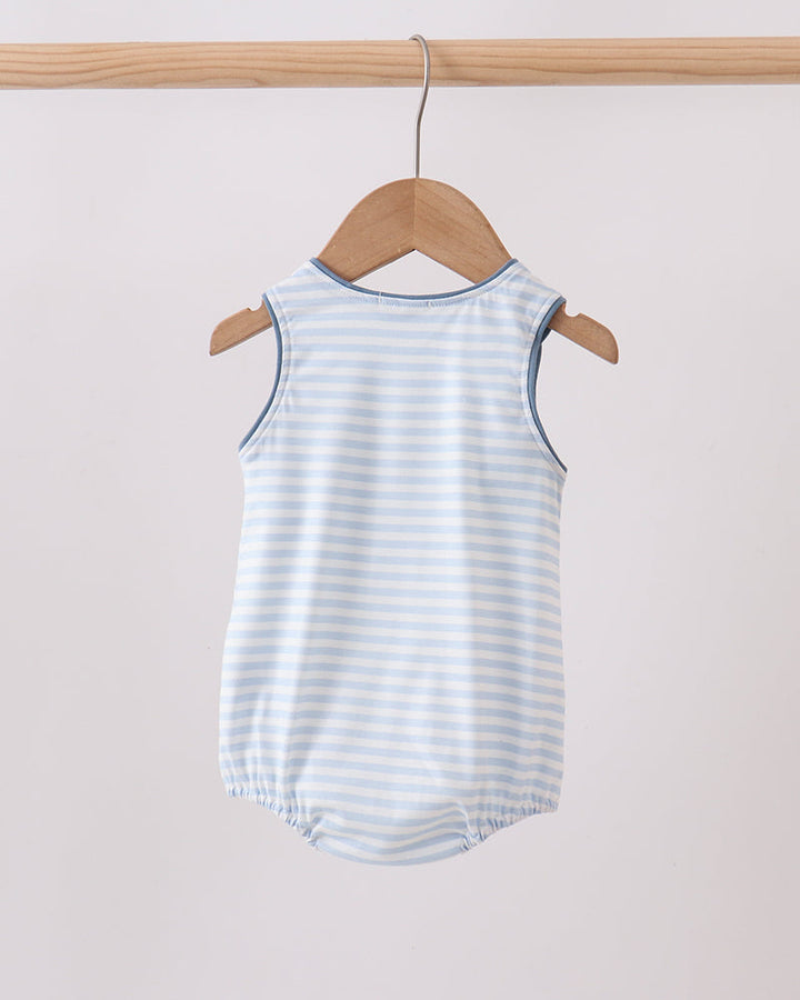 Striped baby romper on a wooden hanger against a white background