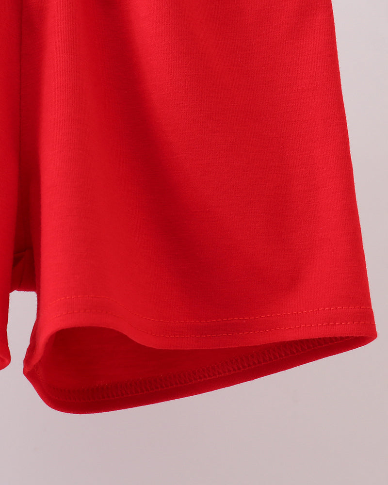 Red toddler shorts with curved hem and stitched edge