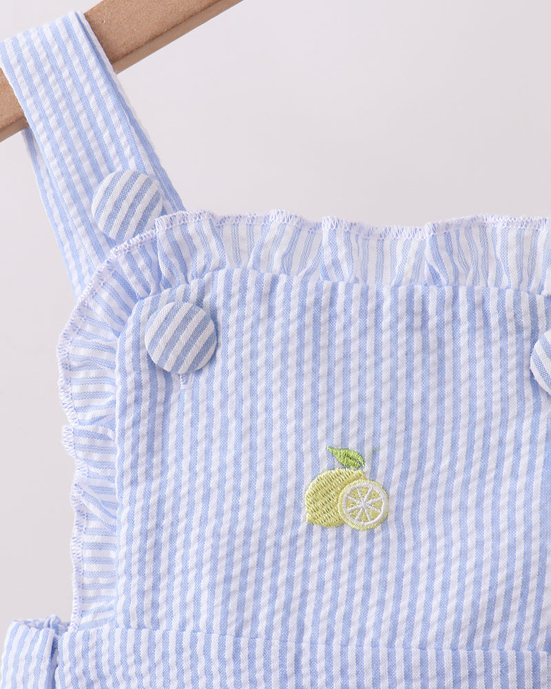 Blue and white striped dress with lemon design on a white background
