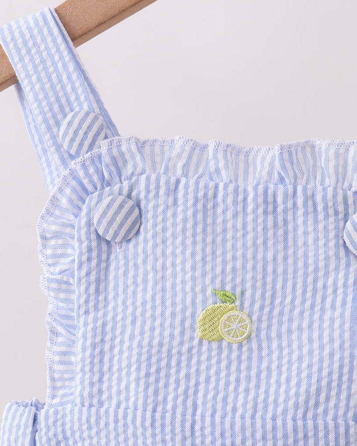 Blue and white striped dress with lemon design on a white background