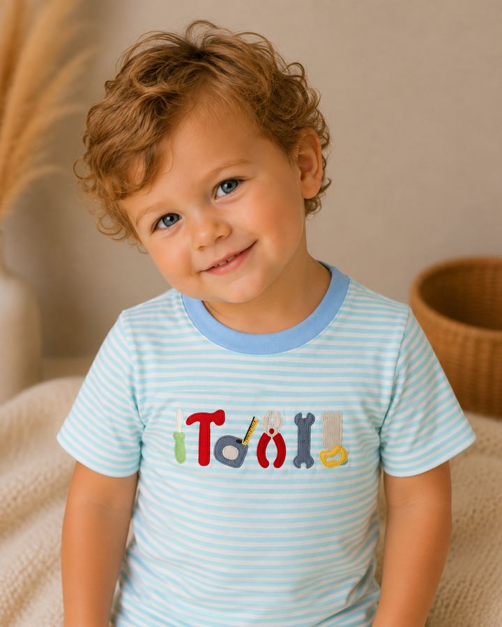 Light blue striped crew-neck T-shirt with colorful tool embroidery front