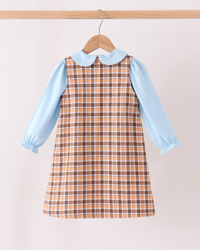 Plaid pinafore dress with light blue long sleeves and peter-pan collar