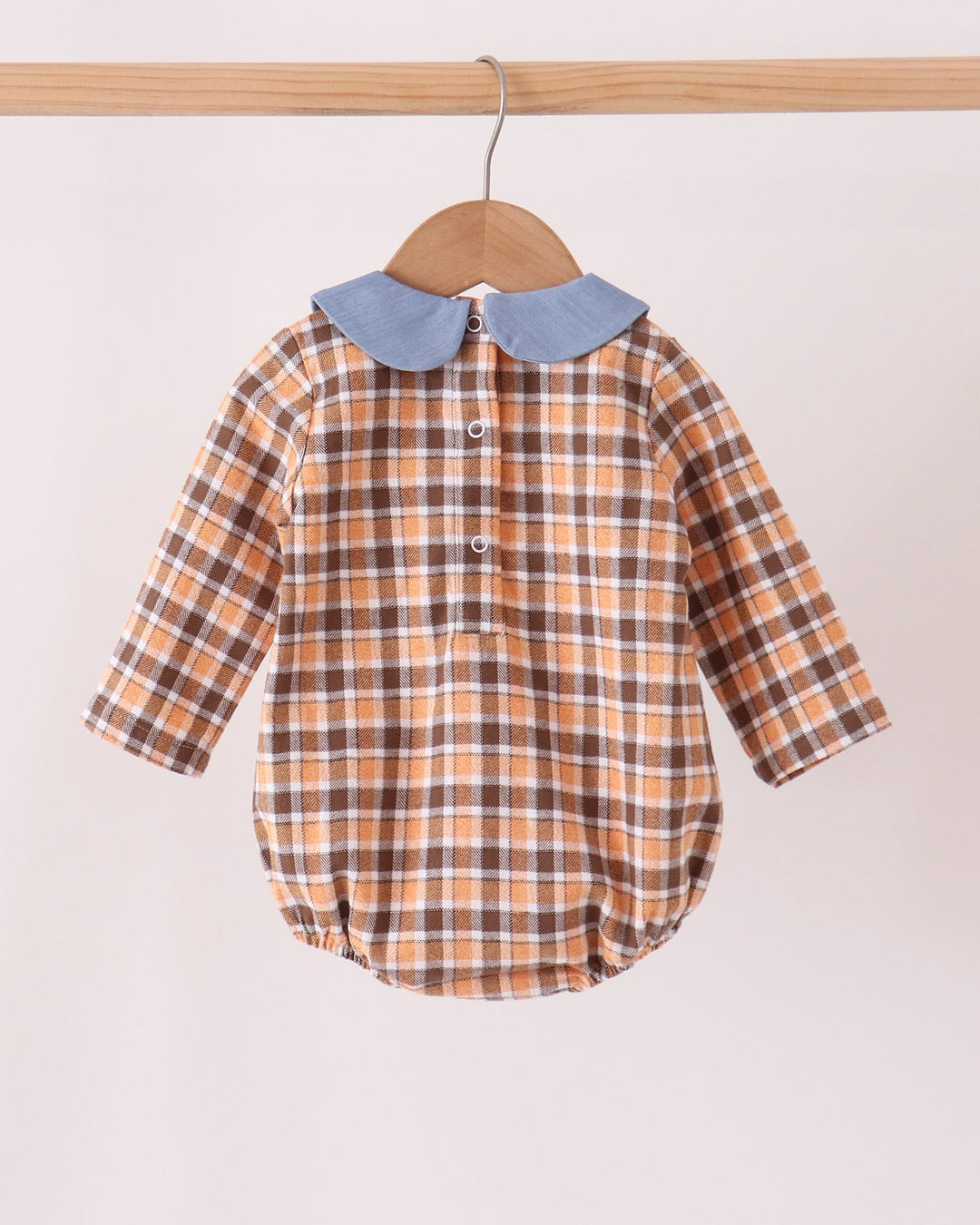 Plaid baby bubble romper with button front and blue Peter Pan collar