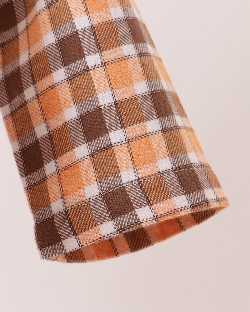 Orange plaid baby romper sleeve with curved hem