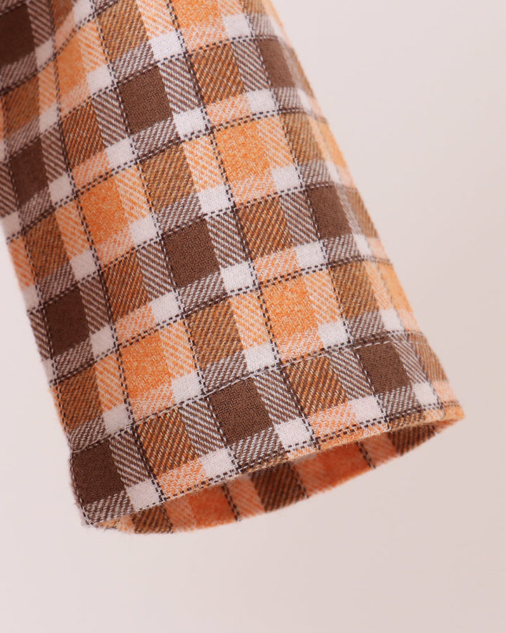 Orange plaid baby romper sleeve with curved hem