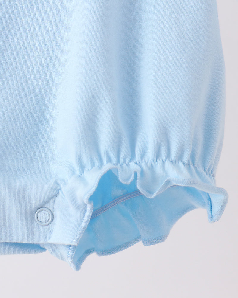 Light blue romper leg hem with gathered ruffle and elastic waistline