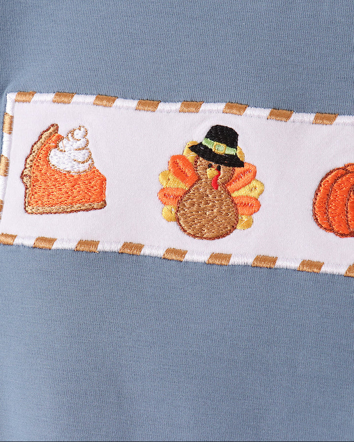 Blue shirt chest embroidery panel with turkey, pumpkin, and autumn icons