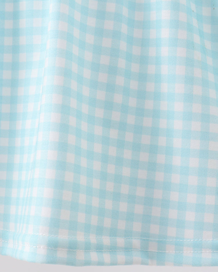 Close-up of a light blue and white checkered fabric