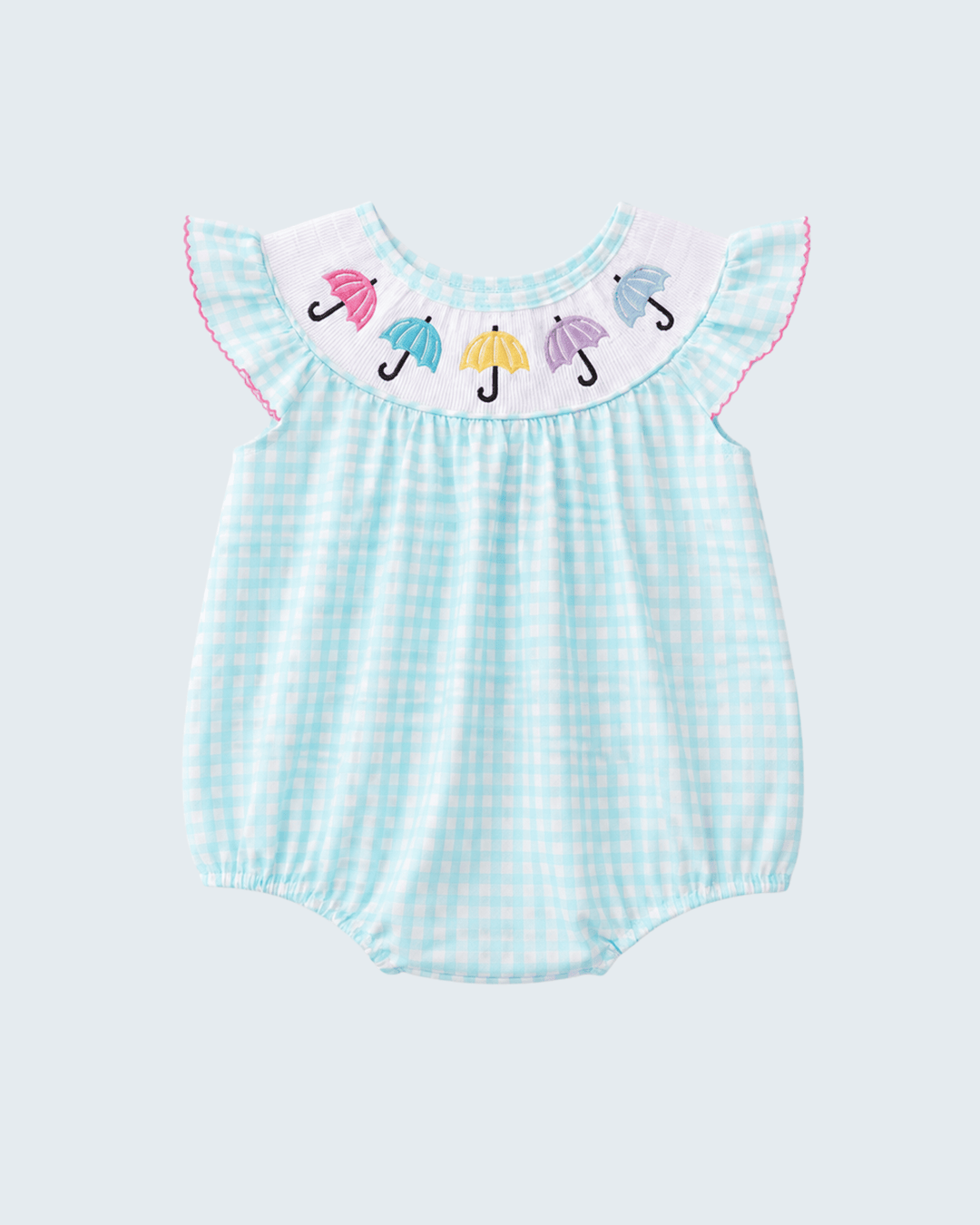 Baby romper with colorful umbrella design on a light blue background