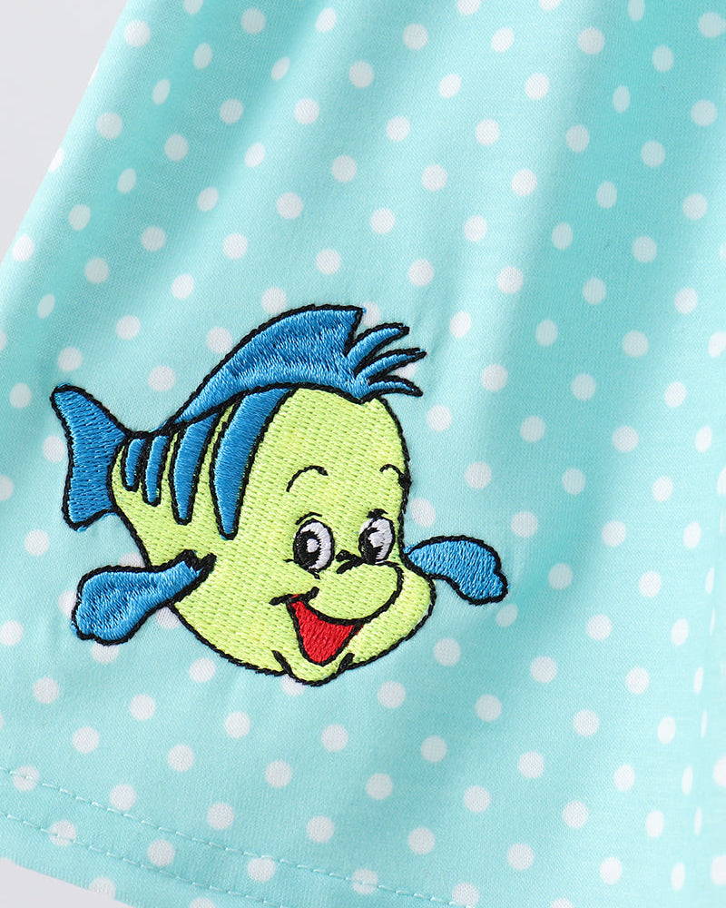 Fish embroidery on blue polka dot dress