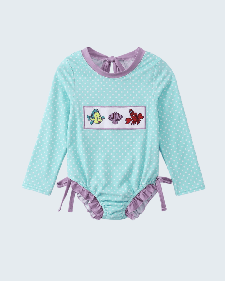 Blue Under The Sea Embroidered UPF Rashguard om light blue background