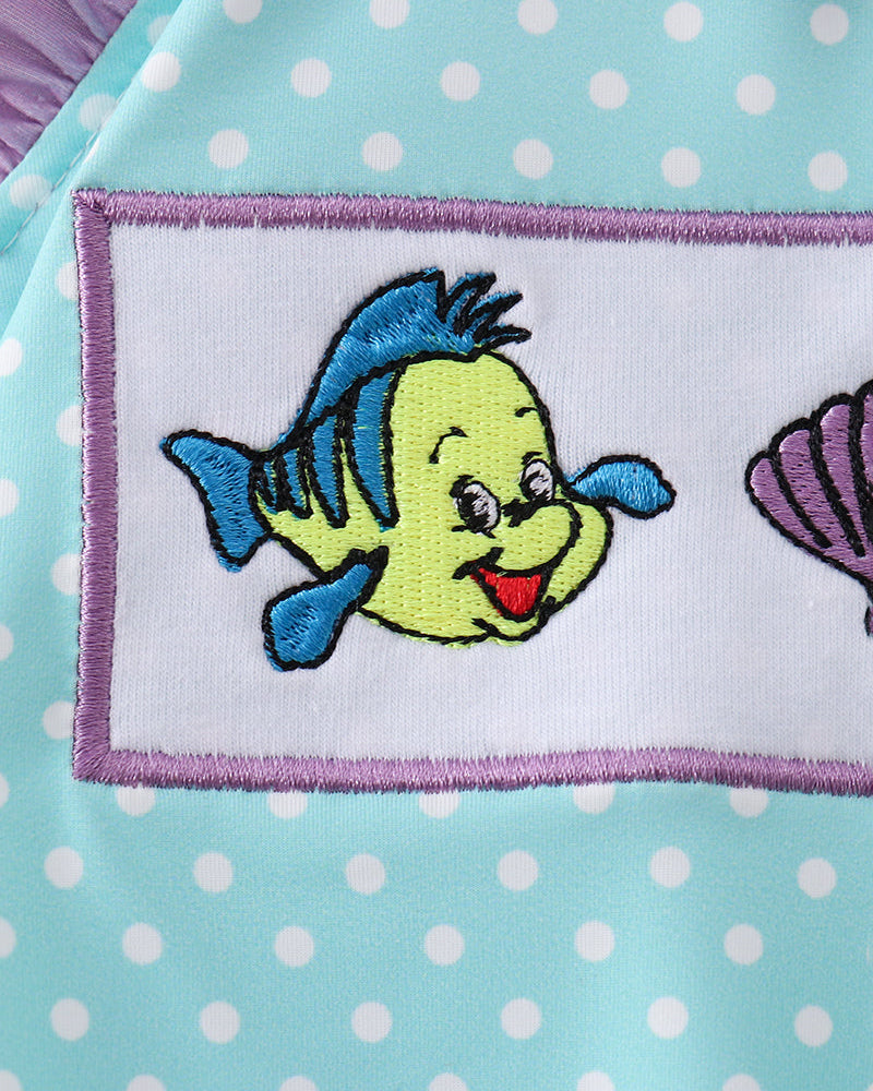 Embroidered fish on polka dot swimsuit