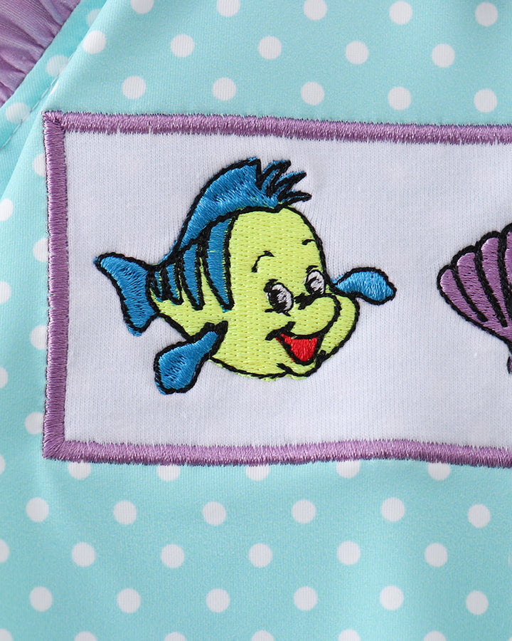 Embroidered fish on polka dot swimsuit