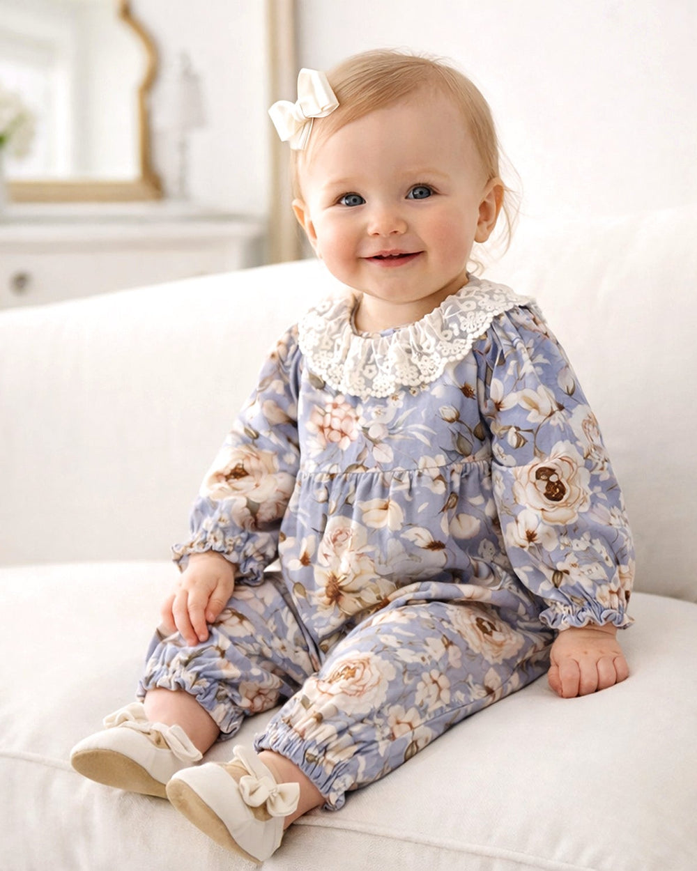 Baby floral linen romper with lace collar, long sleeves and gathered waist