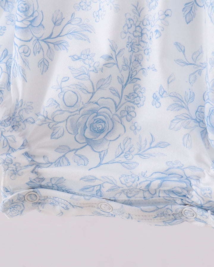 White fabric with blue floral pattern