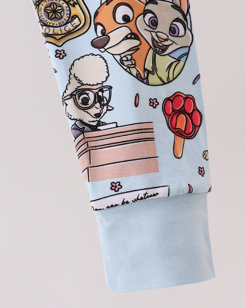 Light blue pajama pants with character graphic print and cuffed hem