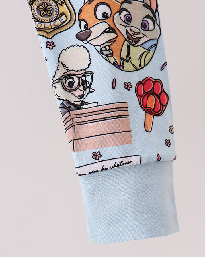 Light blue pajama pants with character graphic print and cuffed hem