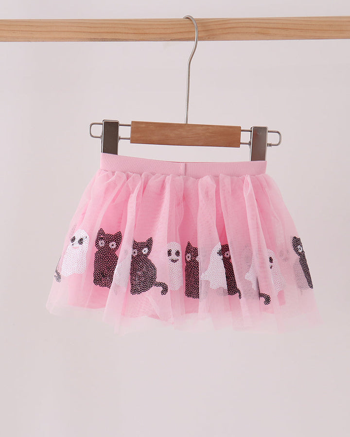 Pink sequin tutu skirt with repeating ghost cat faces and layered tulle hem