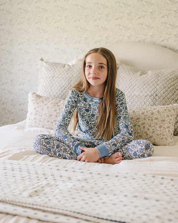 Kids long-sleeve bamboo pajama set with blue floral print top and jogger pants