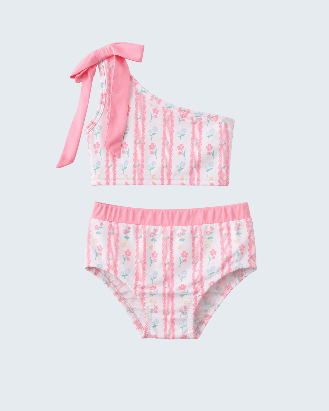 Two-piece swimsuit with pink and floral design on a light gray background