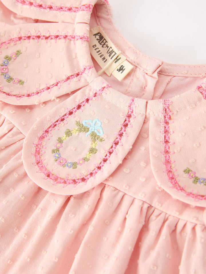 Pink dress with scalloped Peter Pan collar embroidery and multicolor heart motif