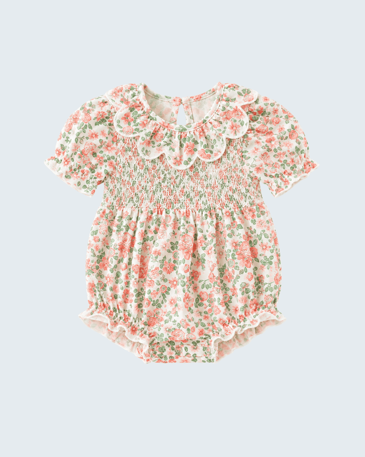 Floral baby romper with smocked yoke, flutter sleeves, gathered waist