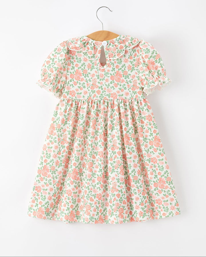 Girls floral smocked dress with ruffle sleeves and keyhole button back, peach and green