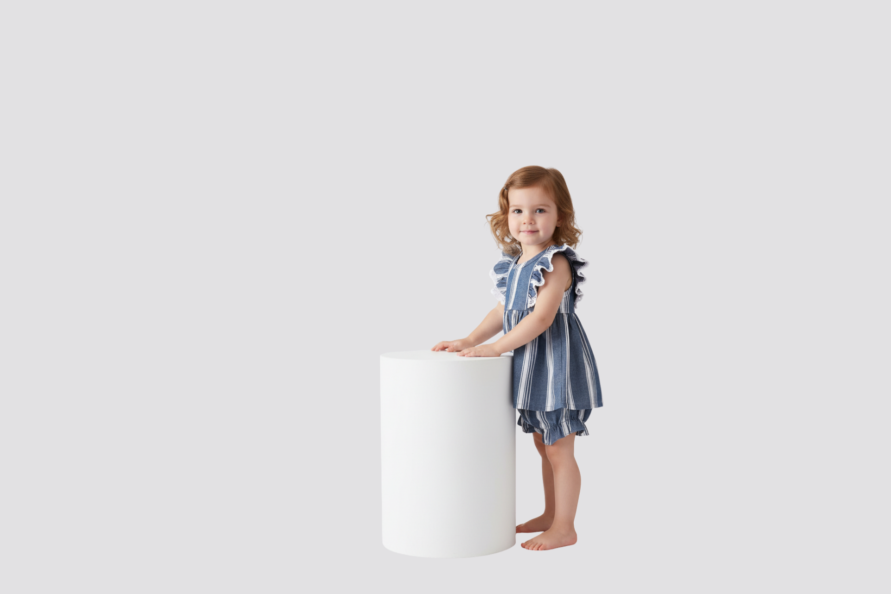 Boutique baby and kids clothing featuring soft cotton outfits for girls and boys at Tots & Trendz