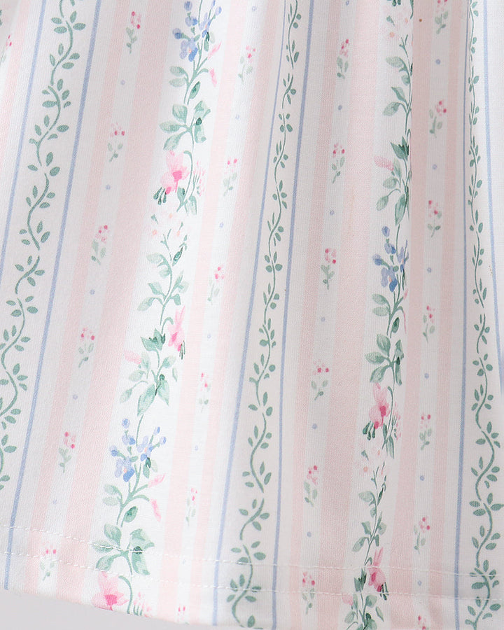 Floral striped fabric with pink, green, and blue patterns on a white background