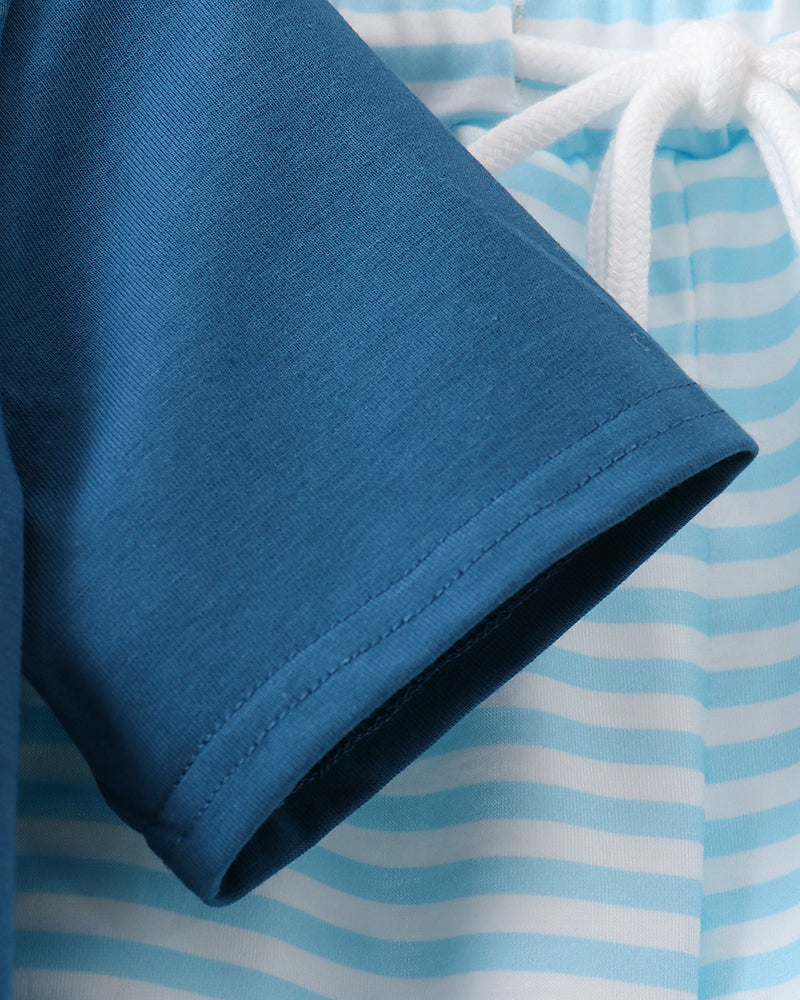 Blue shirt and striped pants