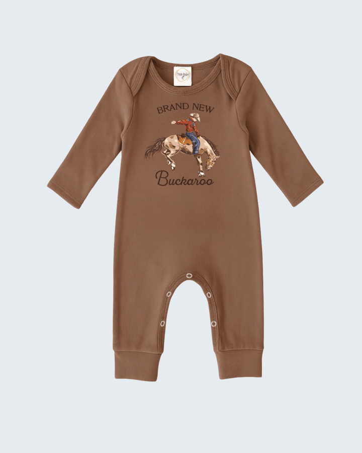 Brown baby romper with cowboy graphic and text on a light blue background
