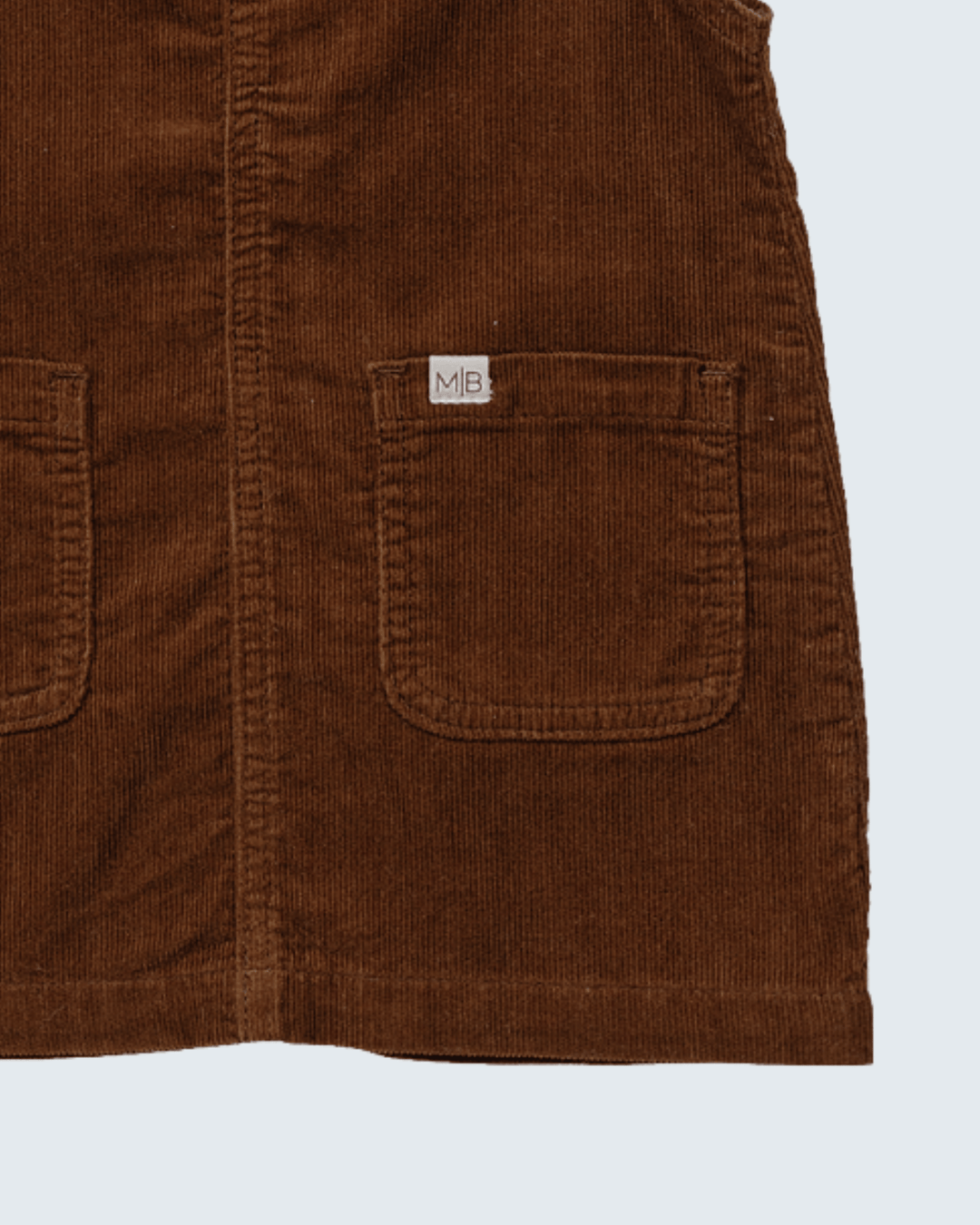 Brown corduroy overall dress front panel with chest patch pocket and brand tag