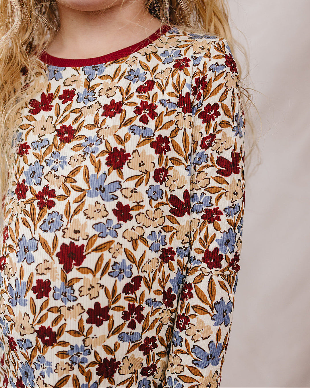 Floral long-sleeve pajama top with crew neckline and burgundy trim