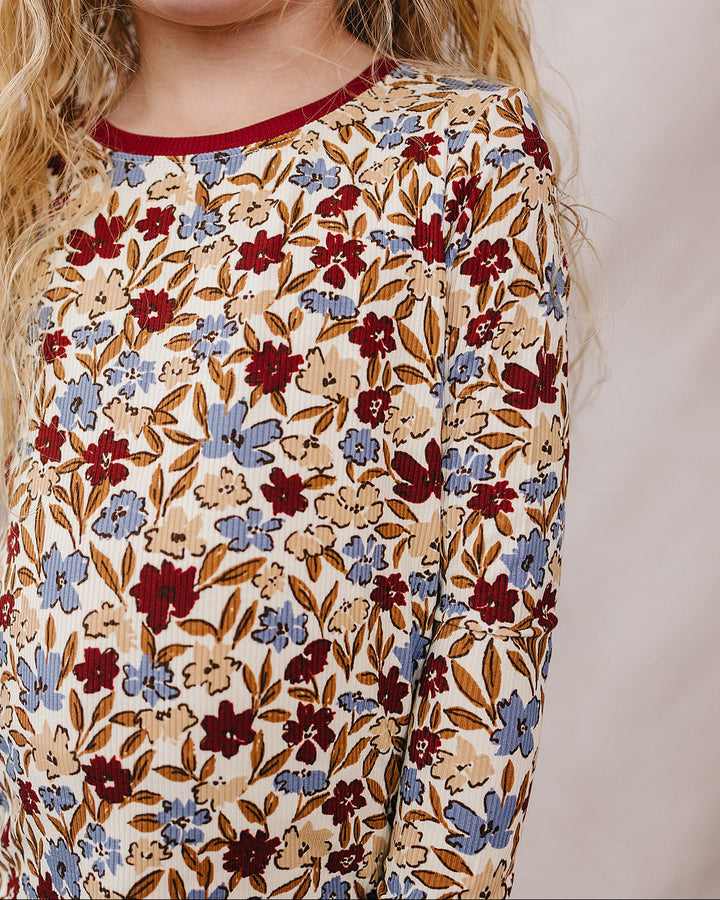 Floral long-sleeve pajama top with crew neckline and burgundy trim