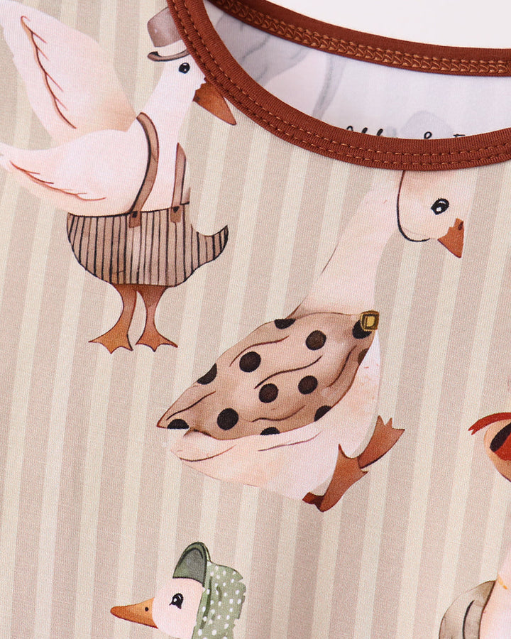 Cream pajama top with long sleeves and all-over brown animal print