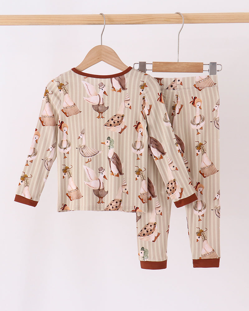 Cream pajama set with long sleeves and long pants, brown animal print