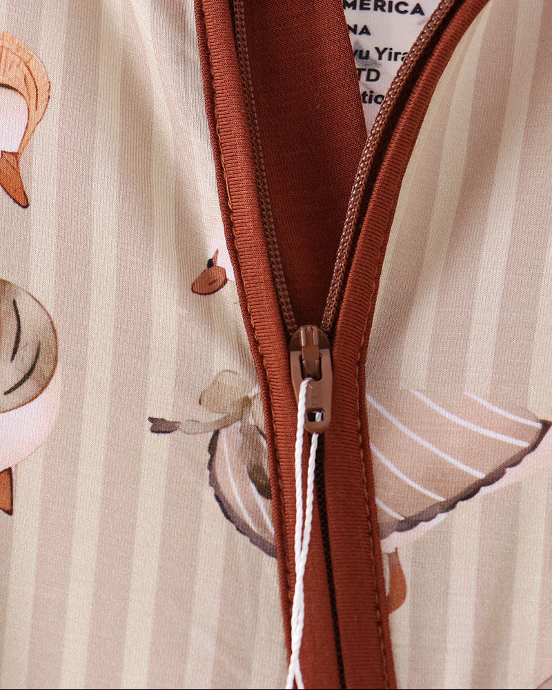 Animal-print romper front zipper with brown trim and metal pull tab