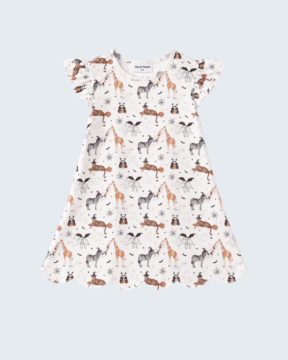 A baby girl's short-sleeve dress with a whimsical woodland print featuring deer, foxes, owls, and snowflakes on an off-white background, shown flat against a light gray background.