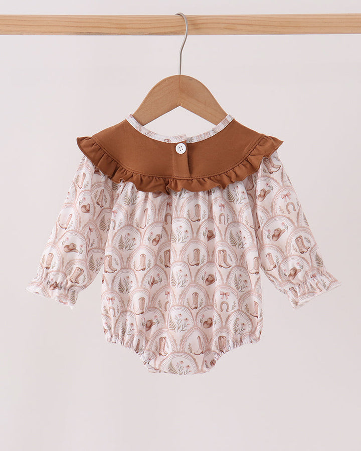 Cream print bubble romper with brown ruffle collar and long sleeves, gathered legs