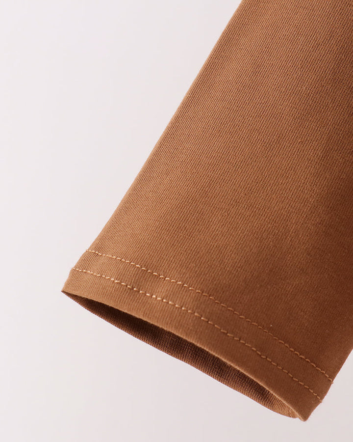 Brown long-sleeve top with stitched cuff hem