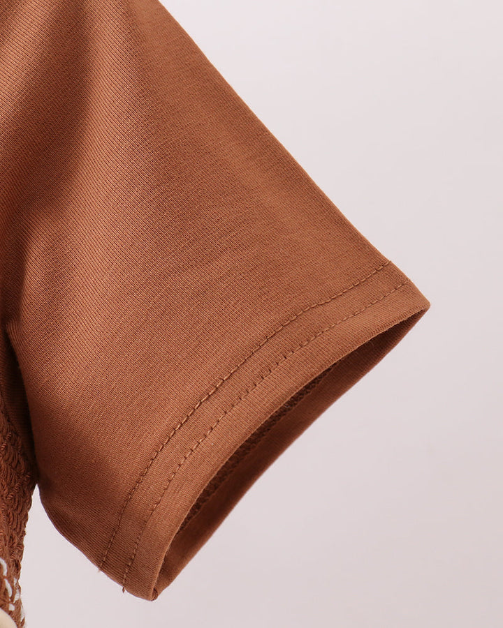 Brown short sleeve with stitched hem and smocked white-trim edge